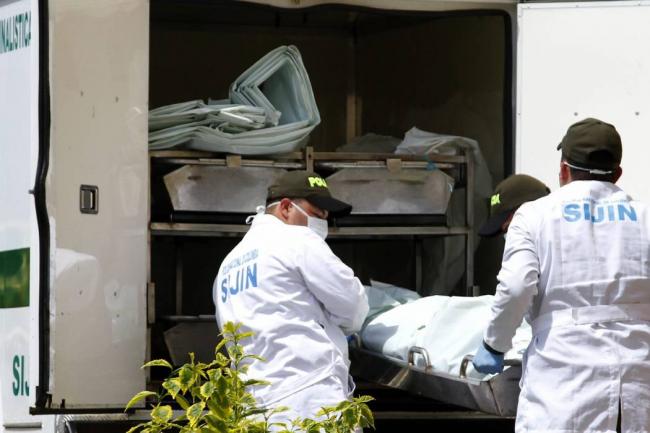 Levantamiento-de-cadaver-SIJIN Mujer asesinada en Bello: su hijastro fue capturado como principal sospechoso